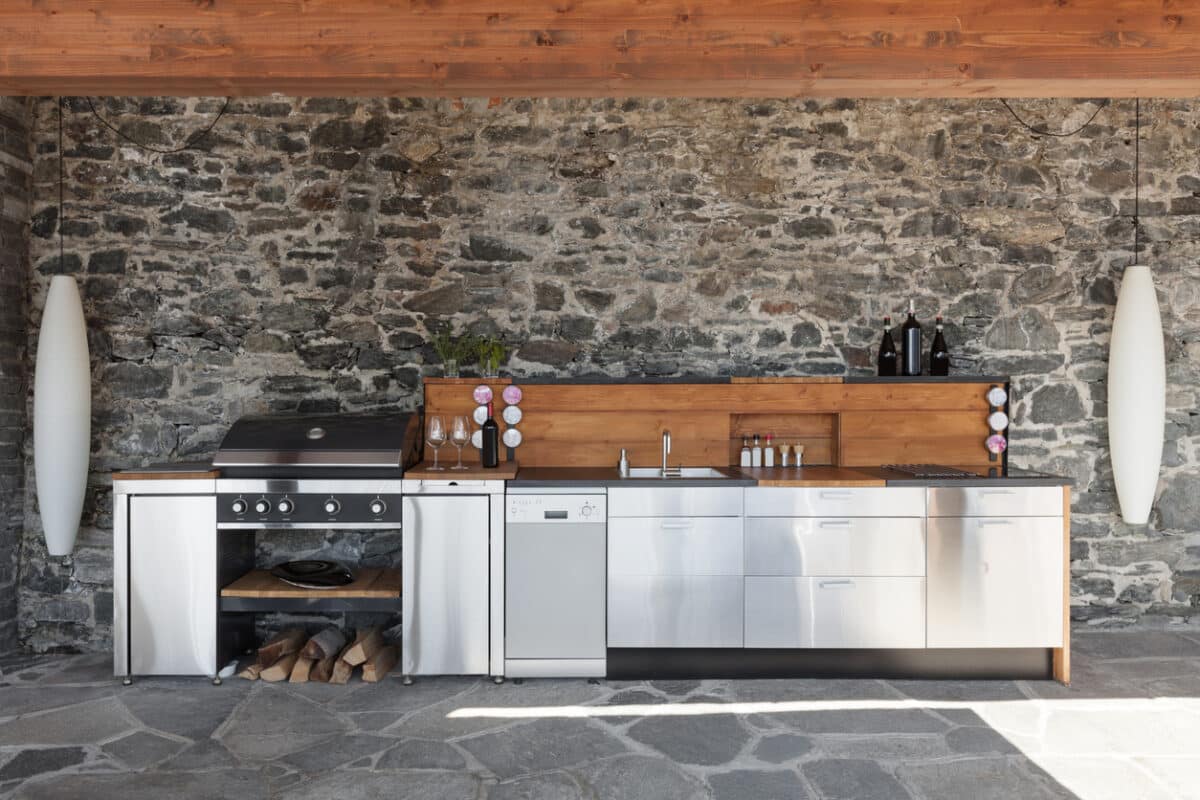 House, modern kitchen with barbecue on the veranda